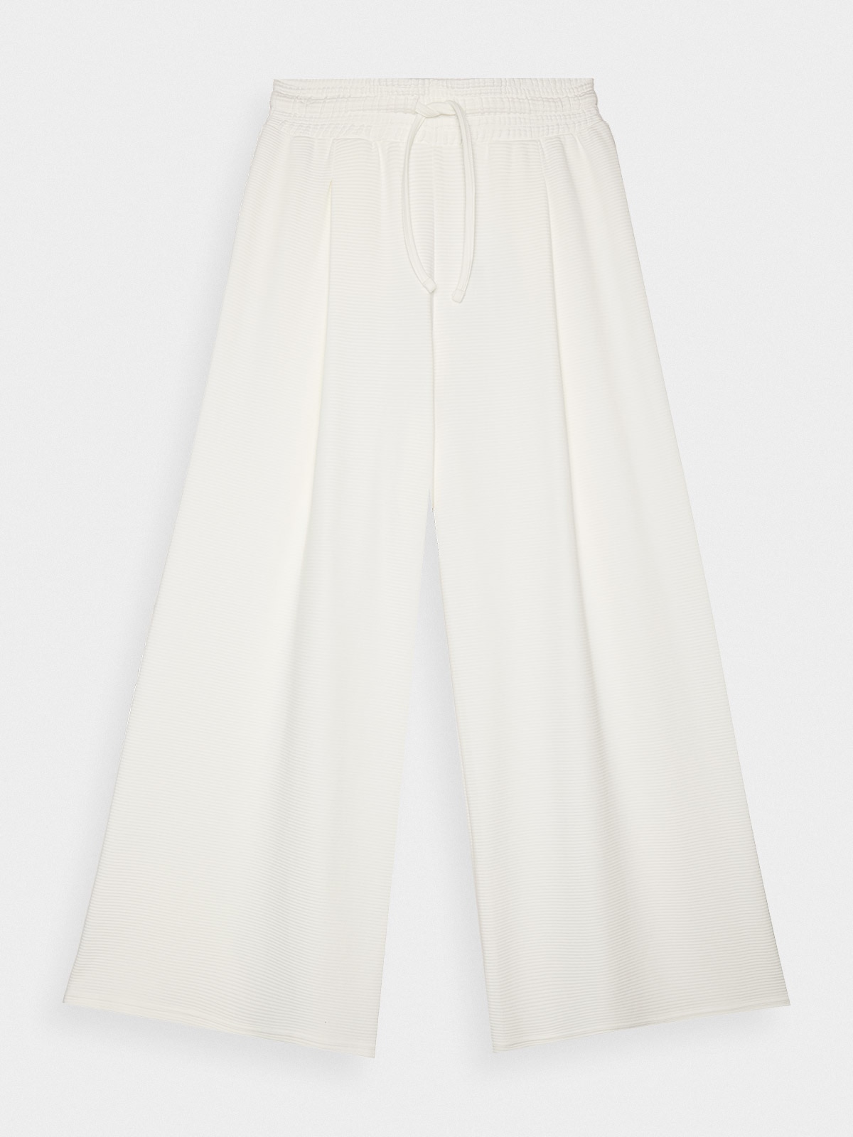Dámske teplákové nohavice s rozšíreným strihom - biele