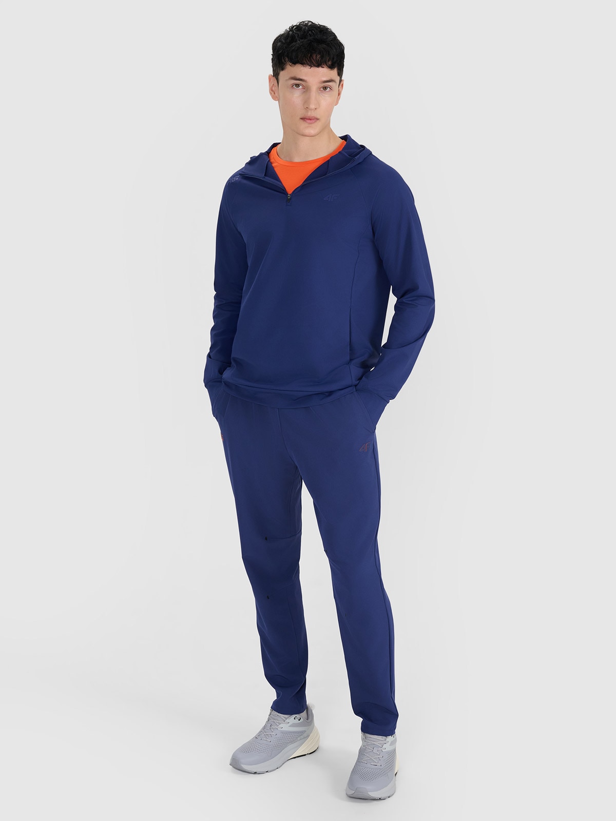 Pantaloni de antrenament cu uscare rapidă pentru bărbați 4F x Robert Lewandowski - bleumarin