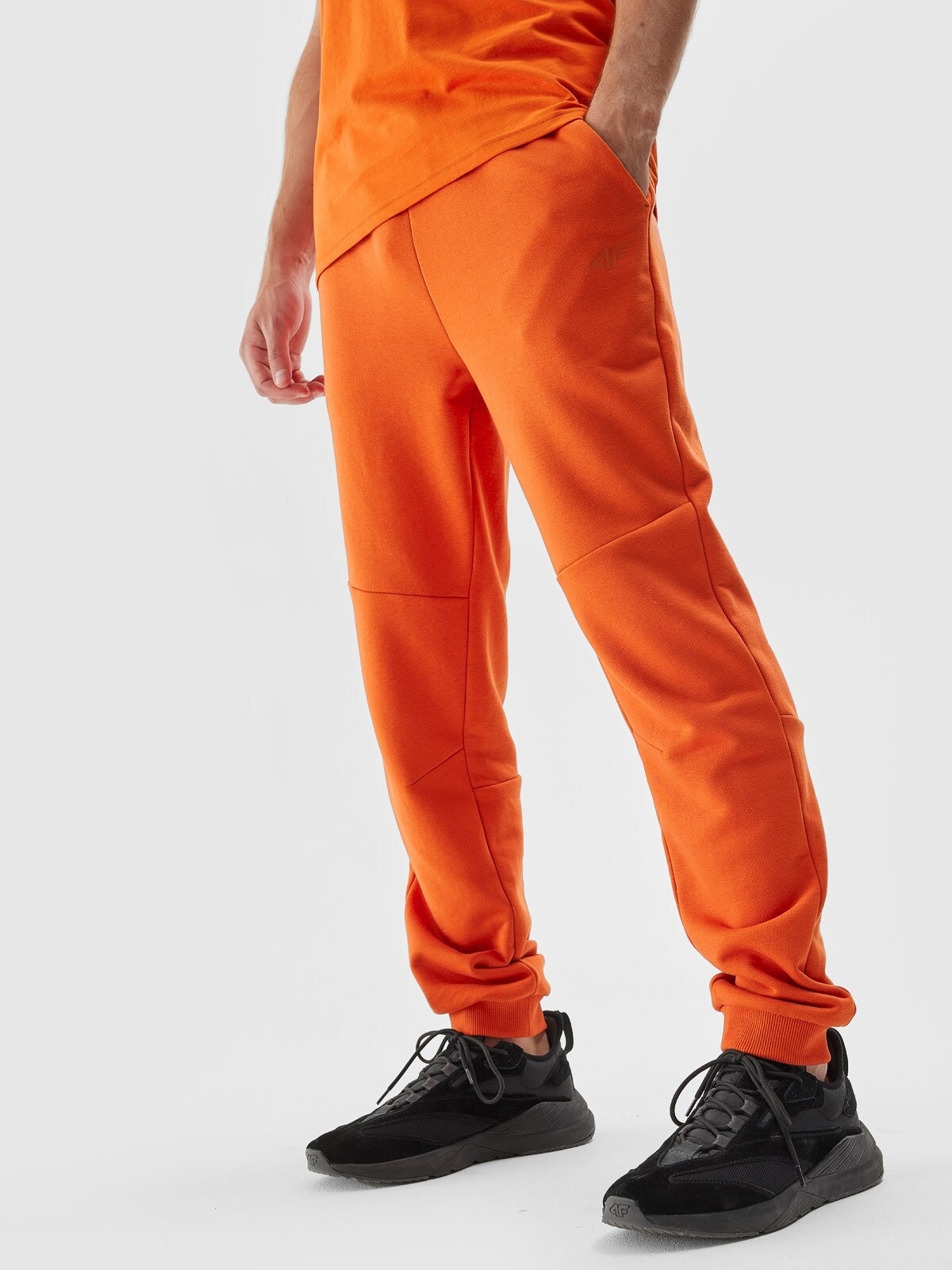 Men s joggers sweatpants orange 4F Sportswear and shoes